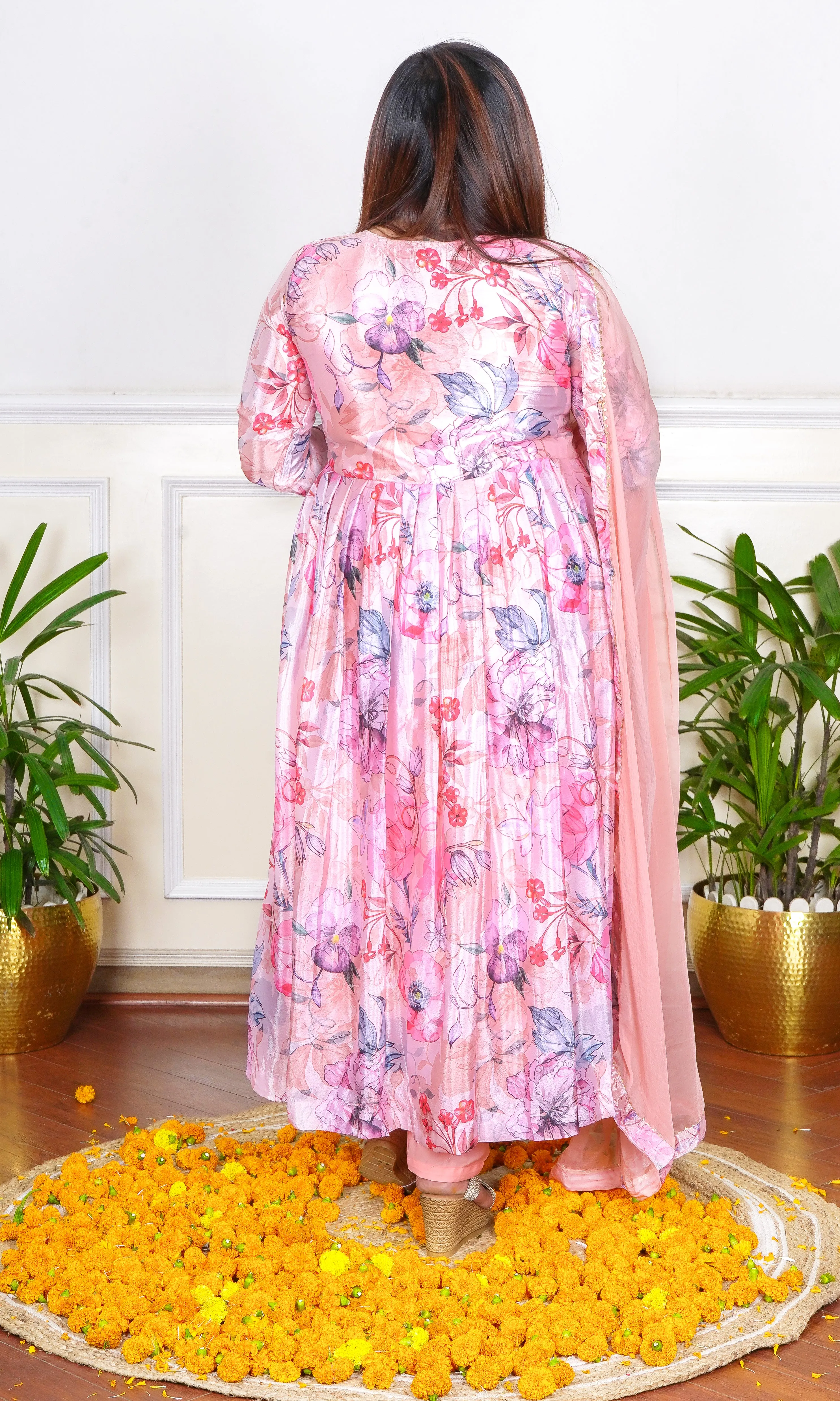 PEACH FLORAL PRINTED SEQUIN, THREAD AND CUTDANA EMBROIDERED NECKLINE FLARED KURTA WITH PANTS AND DUPATTA.